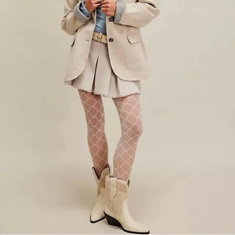 Women's Natural Pitchfork Point
Leather & Shearling Boot
Free People
ARCTIC FOX - Picture 3 of 7